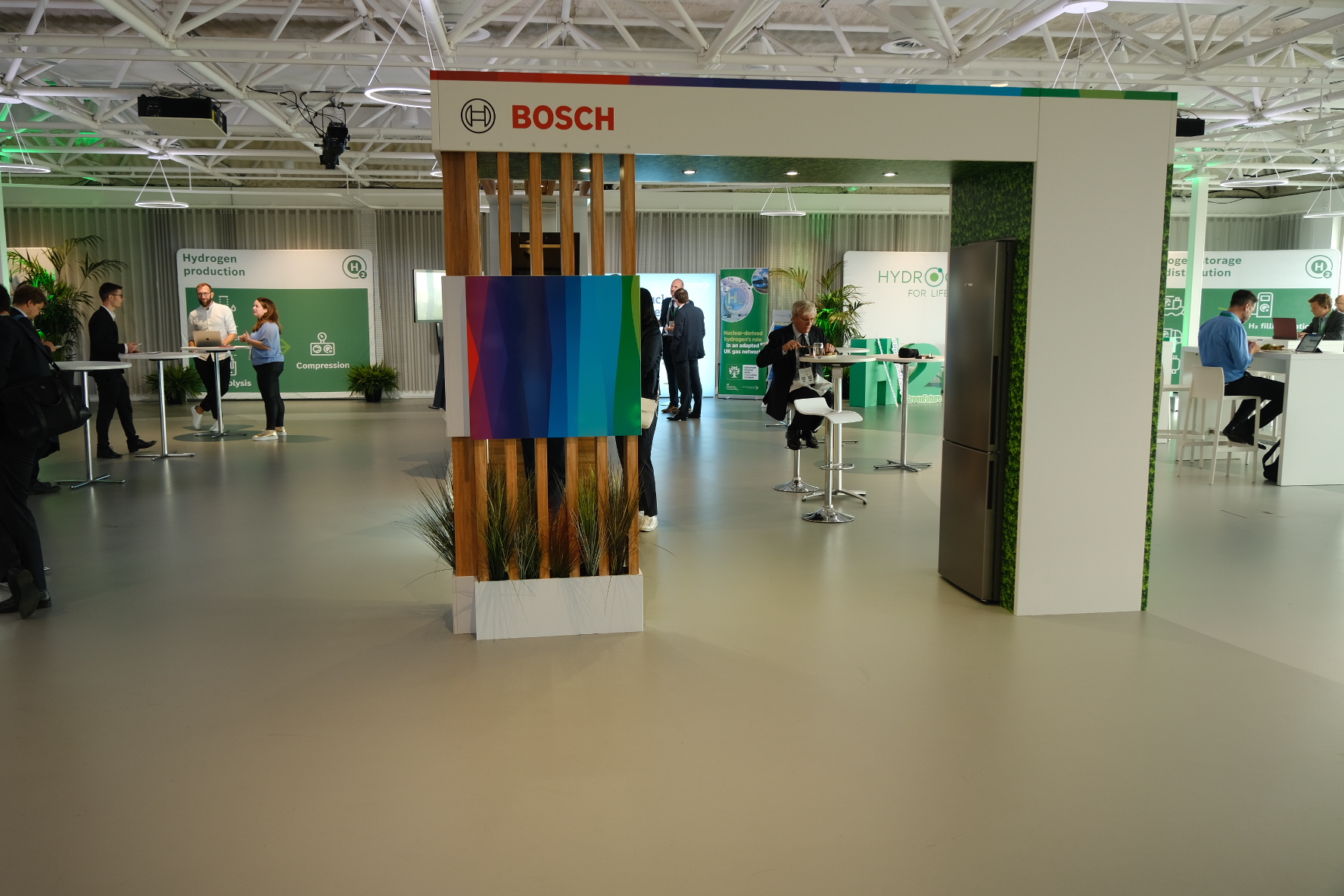 Bosch Hydrogen 4 Life sustainability exhibition stand with timber gateway and living greenery